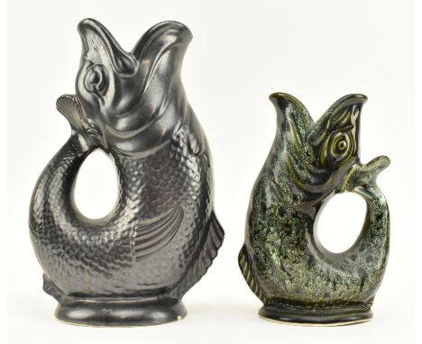 Two vintage 20th century ceramic fish gluggle jugs. The lot comprising a gluggle jug by Dartmouth Devon in matte metallic bla