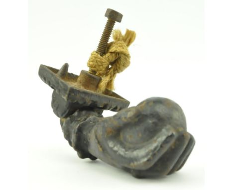 A mid 19th century Victorian cast iron door knocker, formed in the shape of a hand. The hand modelled with ball knocker, comp