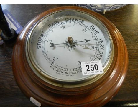 A circular precision barometer. 
