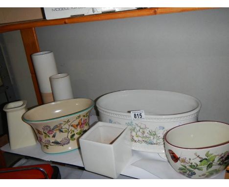 A shelf of ceramics. 