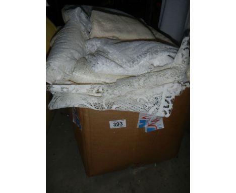 A box of net curtains. 