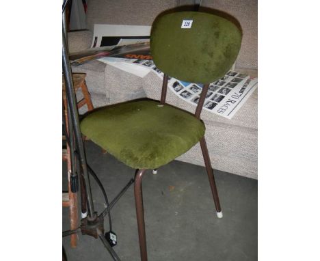 A vintage metal framed chair. COLLECT ONLY. 