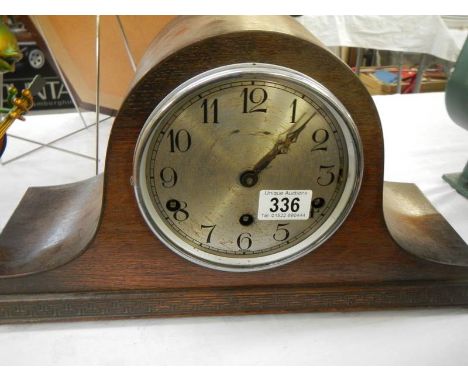 An old oak mantel clock. 