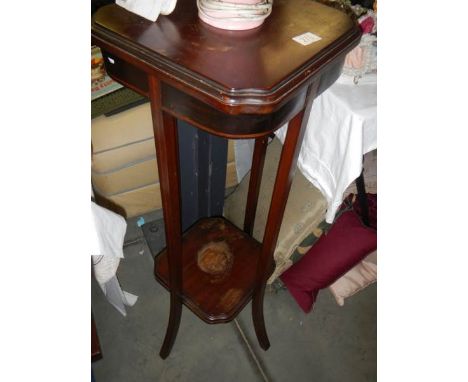 A mahogany inlaid plant stand. COLLECT ONLY. 