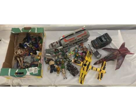 A collection of vintage action figures, vehicles etc including TMNT Turtles, Ghostbusters, GoBots Command Centre etc