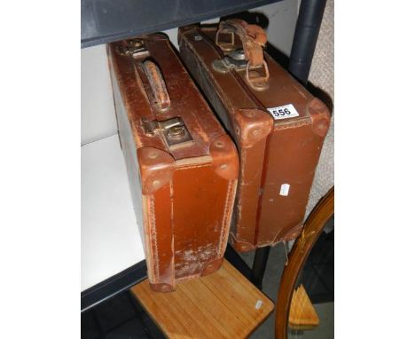 Two small vintage suitcases. 
