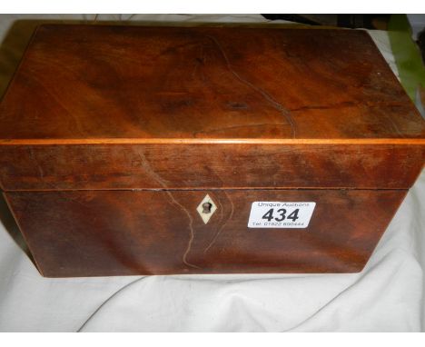 A Victorian tea caddy. 