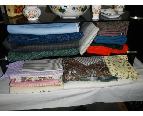 A good lot of vintage fabrics including a piece of leather. 