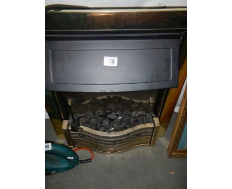 An electric fire with brass coloured surround, COLLECT ONLY. 