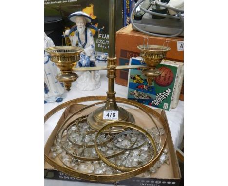 A brass and glass three ring chandelier and a table lamp. COLLECT ONLY. 