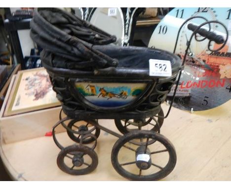 A vintage wooden dolls pram with painted sides, COLLECT ONLY. 