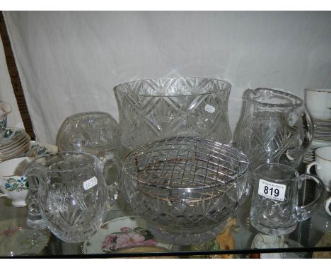 A shelf of glass ware. 