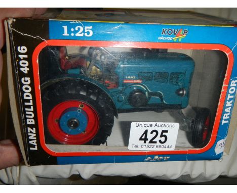 A boxed Lanz Bulldog die cast tractor. 