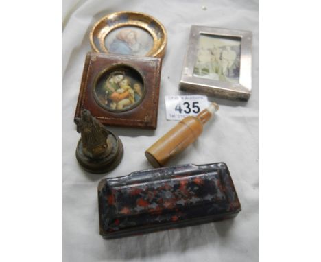 A silver photo frame, two miniatures and a snuff box. 