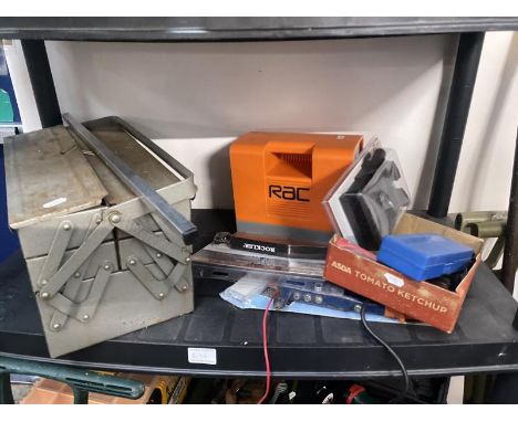 A cantilever tool box with tools