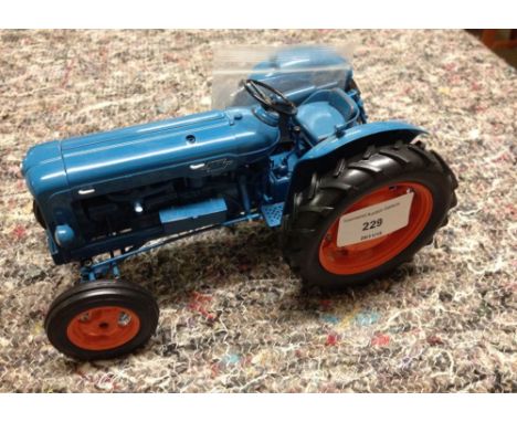 An unboxed Universal Hobbies 1:16 scale Fordson Power Major tractor as found, exhaust broken off