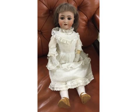 20" German antique bisque doll marked on back of head Heinrich Handwerck Simon Halbig 2¬, dressed in period clothing. With fu