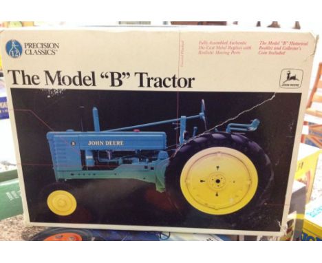 A boxed Precision Classics 1:16 scale John Deere Model B tractor in green as found, back of seat broken off