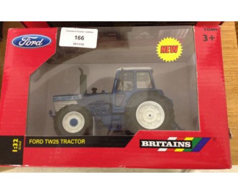 A boxed Britains 1:32 scale Ford TW25 tractor #43011.