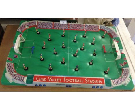 A boxed Chad Valley table football game.