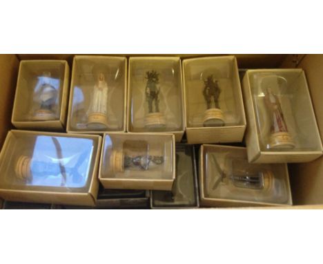 A Lord of the Rings chess set (Set 2) cast in lead and produced by Eaglemoss, together with the pieces accompanying magazines