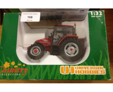 A boxed Universal Hobbies 1:32 scale McCormick CX105 tractor #2389.