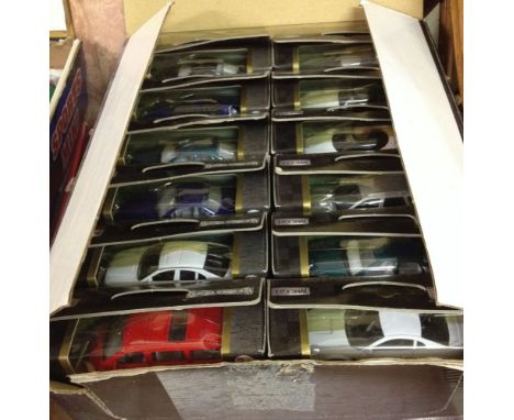 A trade box of 36 1:60 scale Teamsters diecast cars.