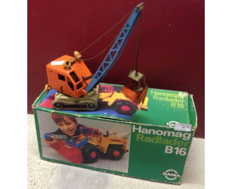 Gama Grab Crane together with a boxed Hanomag Radlader Loading Shovel.