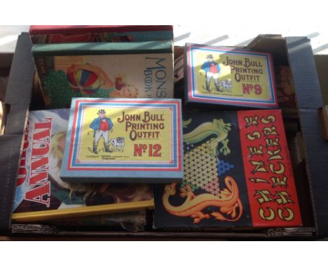 A box containing 1940/50s girls annuals and story books. Together with 2 John Bull printing kits, Chinese checkers & playing 