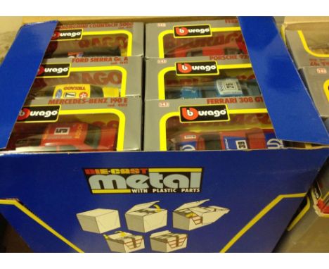 A blue trade box of 24 1:43 scale Bburago cars.