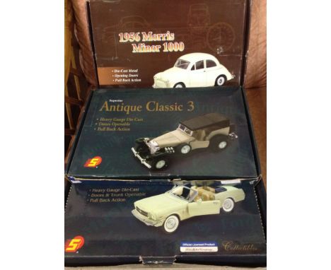 3 trade boxes of 1:26 scale diecast cars: 1) 1956 Morris Minor 1000. 2) 1965 Ford Mustang and 3) Antique Classic (36 cars in 