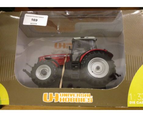 A boxed Universal Hobbies 1:32 scale Massey Ferguson 7499 tractor #UH2850.