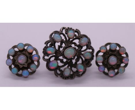 Pair of opal set earrings and brooch 
