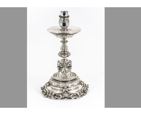 A Victorian and later mixed metal candlestick lamp base, the 1870s silver lower section (14cm high) with leopard masks and ra