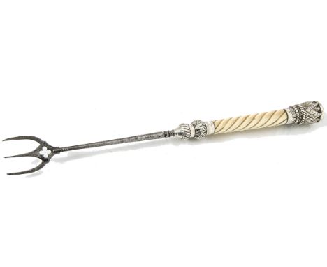 A Victorian toasting fork possibly by Charles Stuart Harris, having silver mounts and twist carved ivory grip 