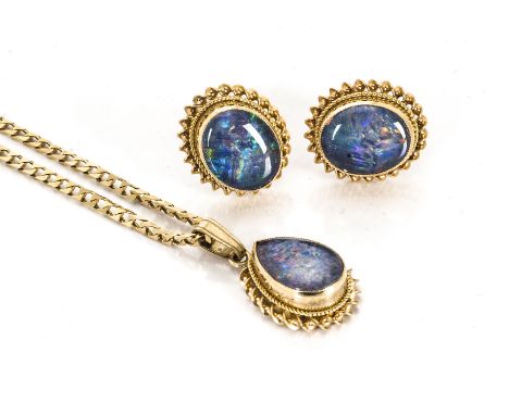 A 9ct gold opal triplet suite, comprising a tear shaped pendant drop and two stud earrings with rope twist mount, 5.9g 
