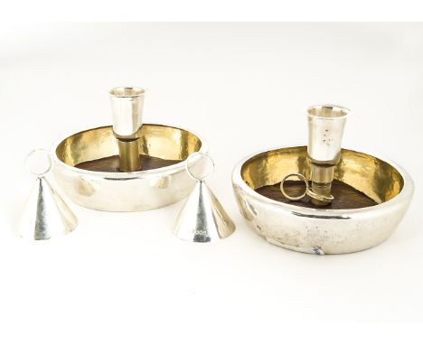 A modern silver Brighton Bun double metamorphic candlestick compendium by Walter Vernon, the two interlocking circular dishes