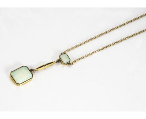 A white opal pendant and chain, the rectangular cut opals in collet settings with elongated oval pierced link on a belcher li
