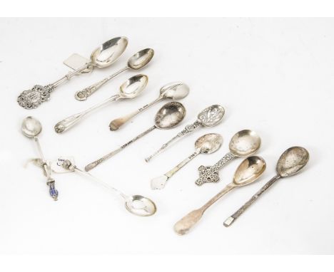 Fourteen silver teaspoons and other small spoons, including a Liberty &amp; Co example with enamelled figure, and Adam &amp; 