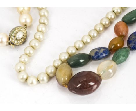 A quantity of various beads, simulated pearls, a gold skinned magic pencil (af), Dunhill lighter and other items 