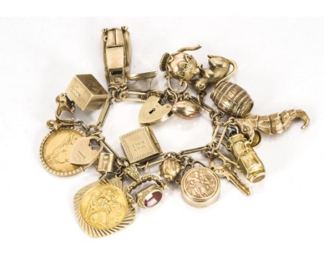 A 9ct gold charm bracelet, with various charms including Rolls Royce motor car, teapot, rugby ball, sea lion, golf bag, compa