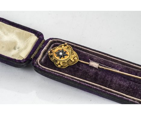 A Victorian gold, silver and enamel pearl set stick pin,  of quatrefoil form centred with an eight pointed star on a blue ena