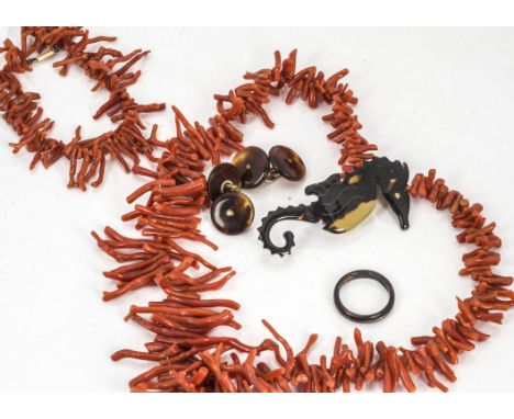 A rough coral necklace and matching bracelet, together with a tortoiseshell seahorse brooch, a pair of tortoiseshell cufflink