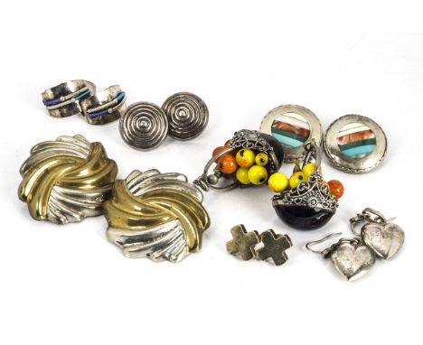 A quantity of white metal earrings, including a large pair of roundel clips, a pair of basket of fruit ring earrings, various