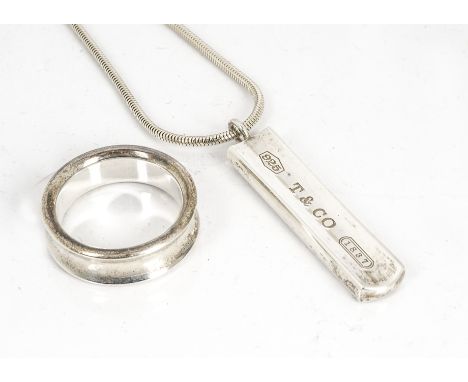 A silver Tiffany &amp; Co drop pendant,  on a fine Tiffany silver chain and a silver Tiffany &amp; Co silver ring, hallmarked