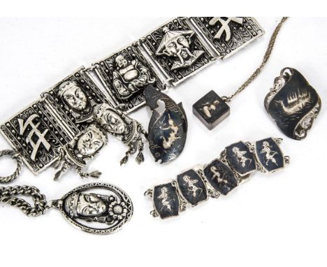 A suite of Siam niello work jewels, including two brooches, bracelet, ring and pendant, together with a base metal Chinese su