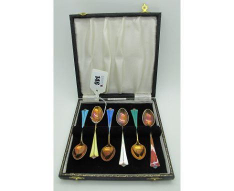 David Andersen; A Set of Six Norwegian Gilt and Harlequin Enamel Coffee Spoons, highlighted in blues, orange, yellow and whit