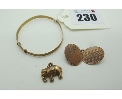 A 9ct Rose Gold Cufflink, (odd) together with a child's expanding bangle and a novelty elephant charm pendant. (3)