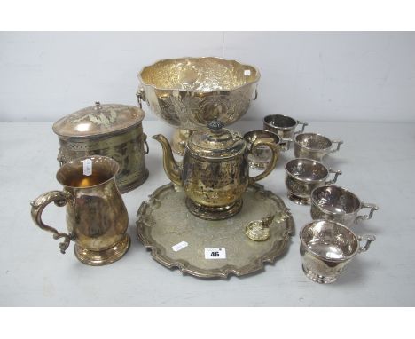 A Decorative Plated Punch Bowl, with twin lion mask ring handles, together with set of six punch cups, a baluster mug, an ova