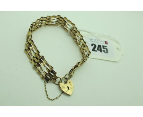 A Gate Link Style Bracelet, to 9ct gold heart shape padlock style clasp. 